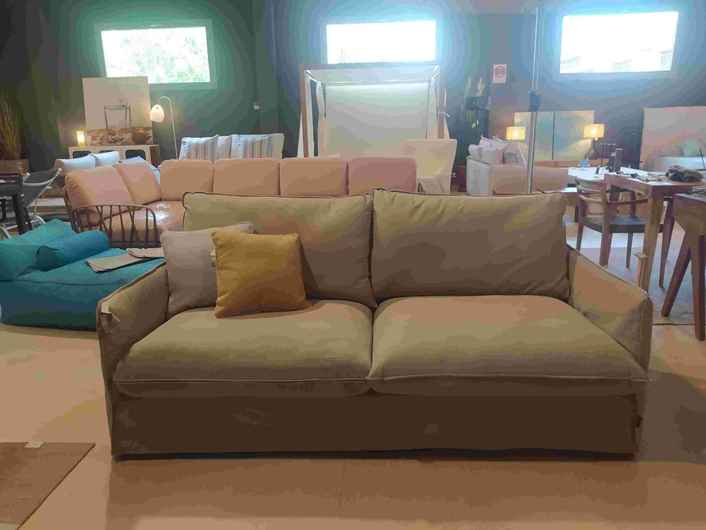 Sofa for up to 3 people in cream.